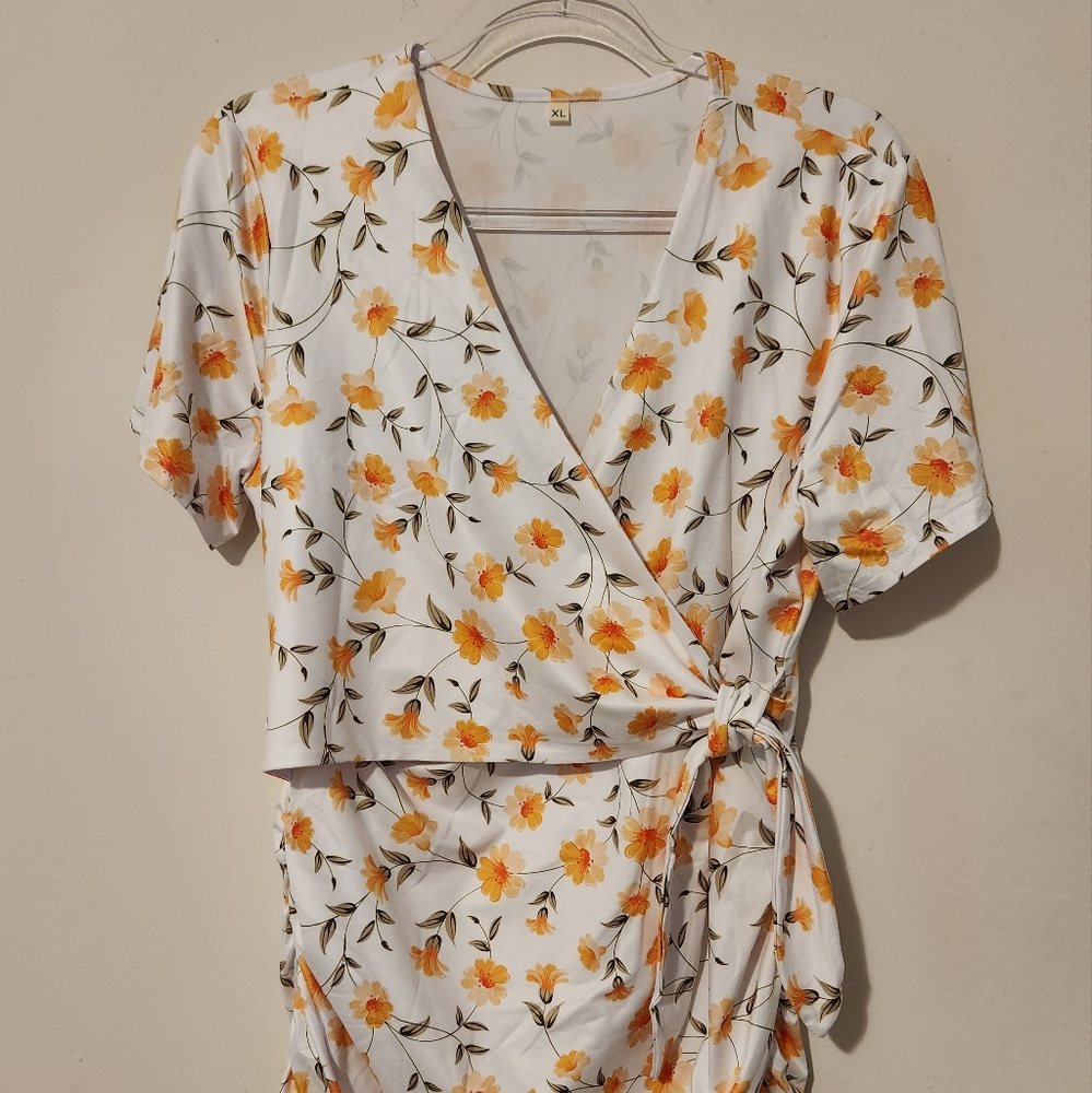 White nursing top with orange flowers